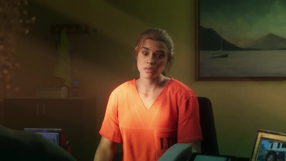 The 2023 first trailer's prison scene, with warm light on Lucia's face and her orange uniform