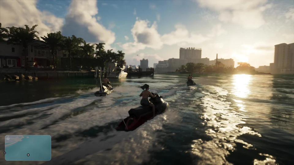 Lucia rides a red-and-black jet ski on an urban waterway behind two other riders