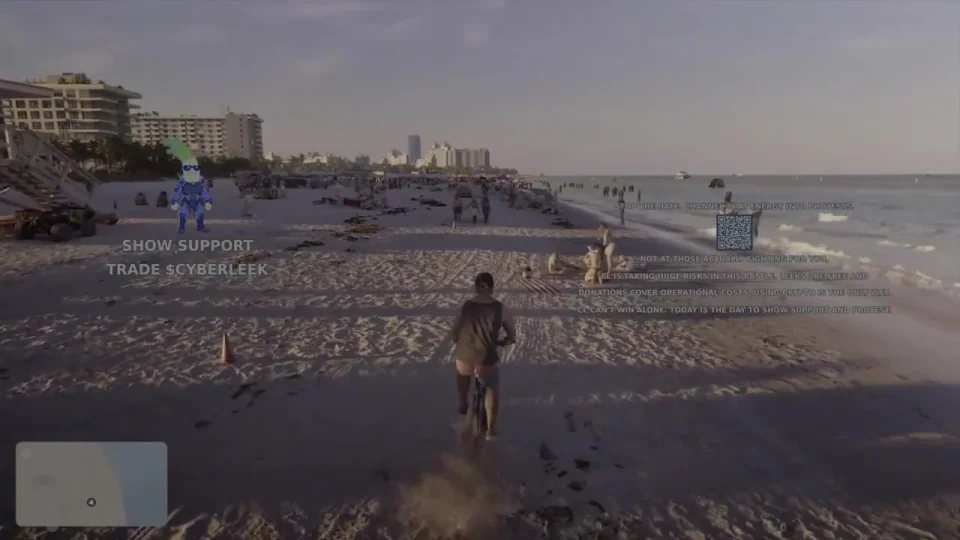 La bicicleta de Jason deja una huella y levanta arena junto a las olas