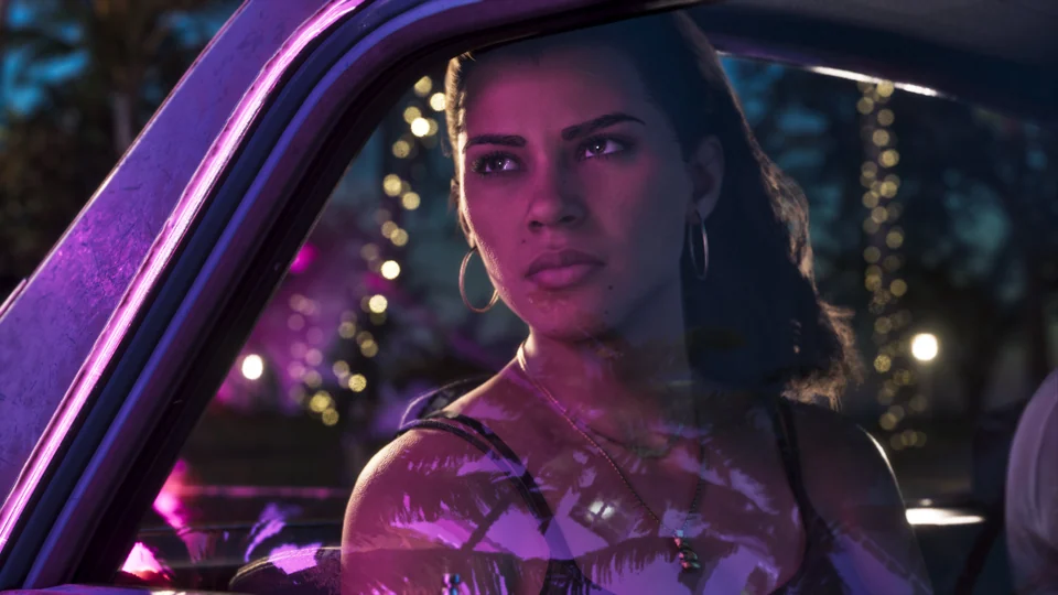 Lucia looking out of a car window in an official Rockstar Games screenshot
