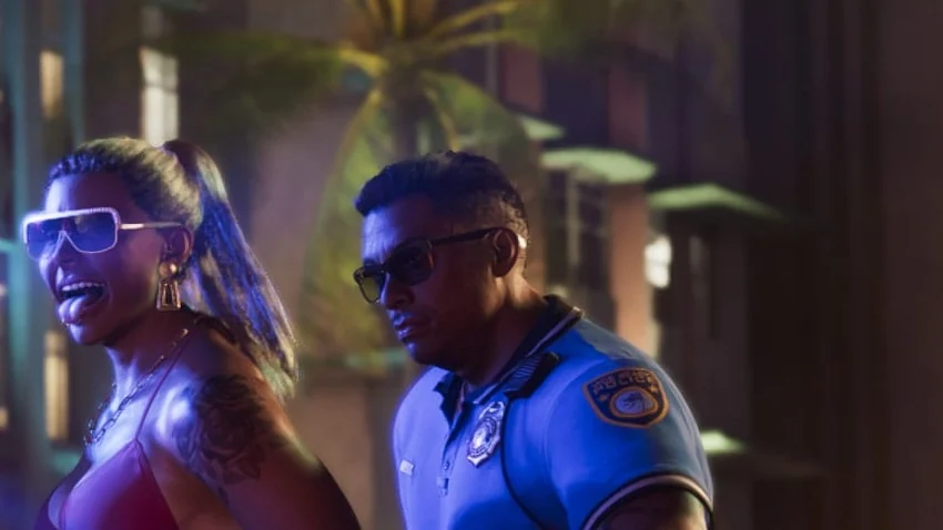 Polizisten und ein Vice-Beach-Police-Auto nachts in Vice City, offizielles Rockstar-Bild
