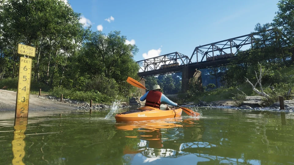 River and kayak beside a railroad bridge in Mount Kalaga National Park