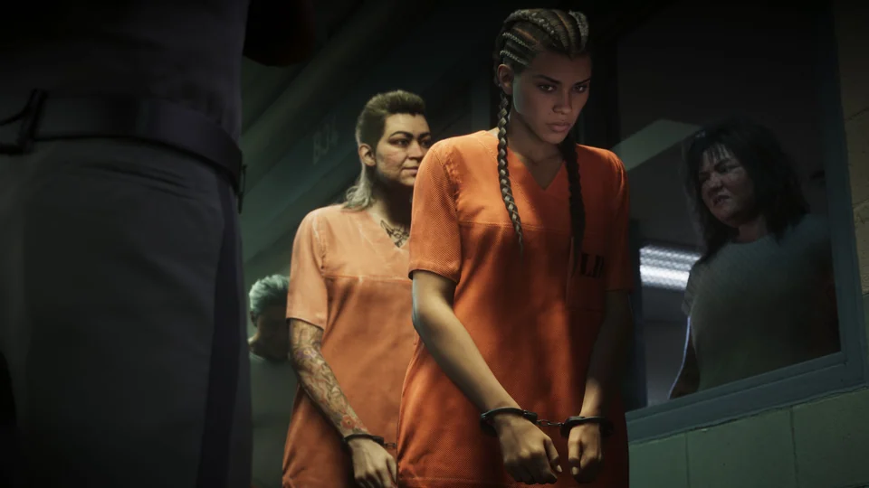 Lucia in prison clothing and handcuffs