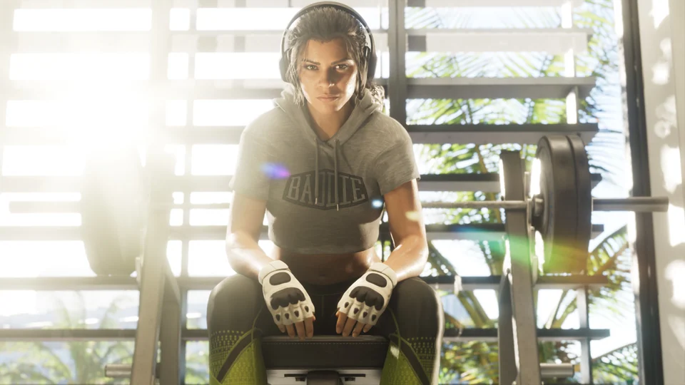 Lucia sitting in a gym wearing sportswear