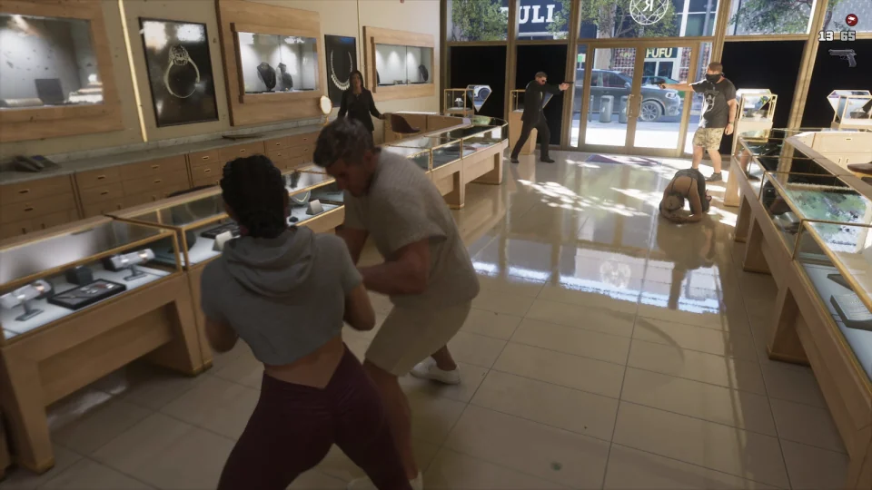 Lucia kämpft in GTA 6 neben einem Ladentresen mit einem Mann