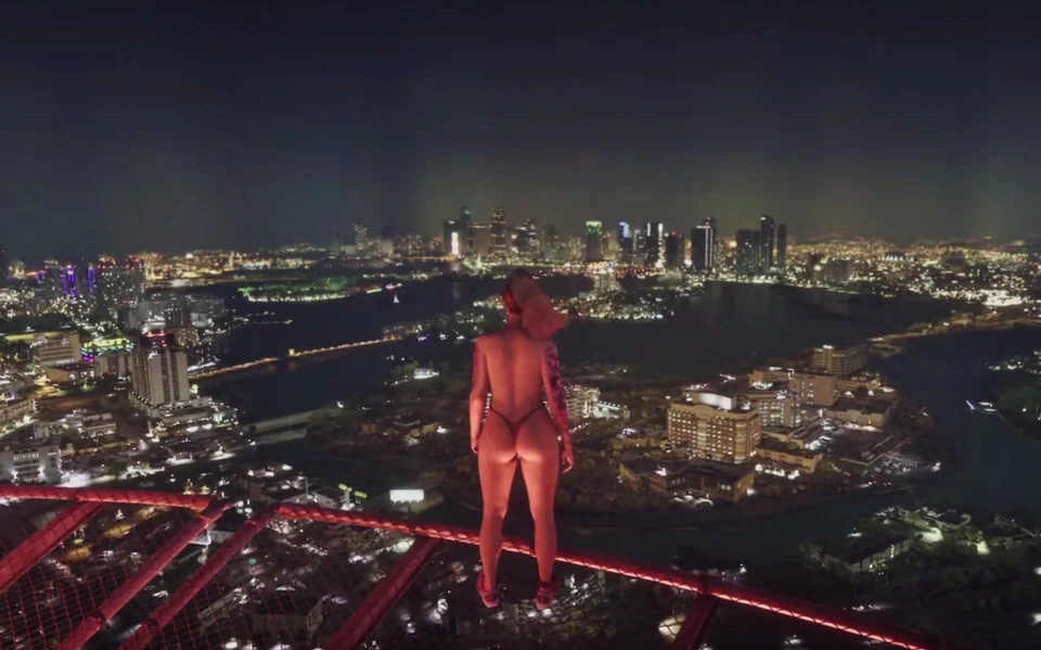 A frame from An Extended Leek showing a character on a bridge above a city at night